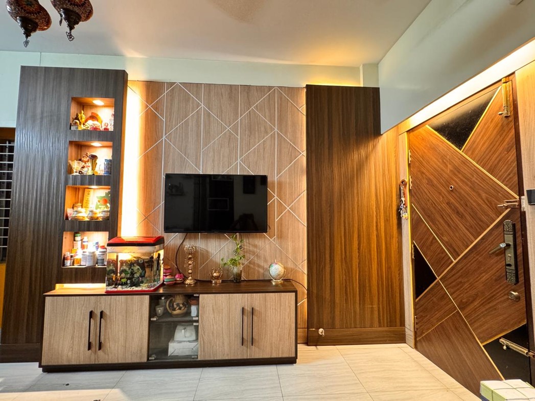TV cabinet, Wall Panel and entry door with warm evening lighting