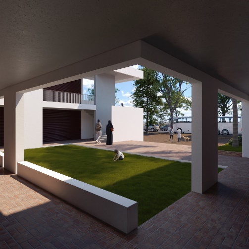 Covered walkway framing the courtyard with low seating and shade