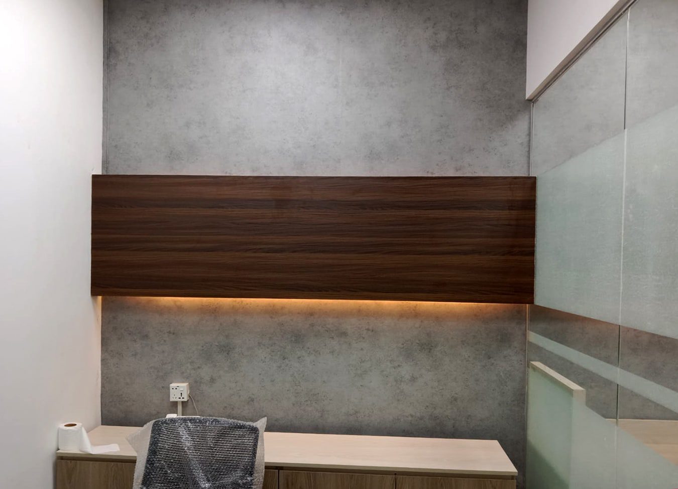 Executive room back wall with timber panel and concealed lighting in ERD small office interior Dhaka - small office design for ERD, Planning Commission, Dhaka
