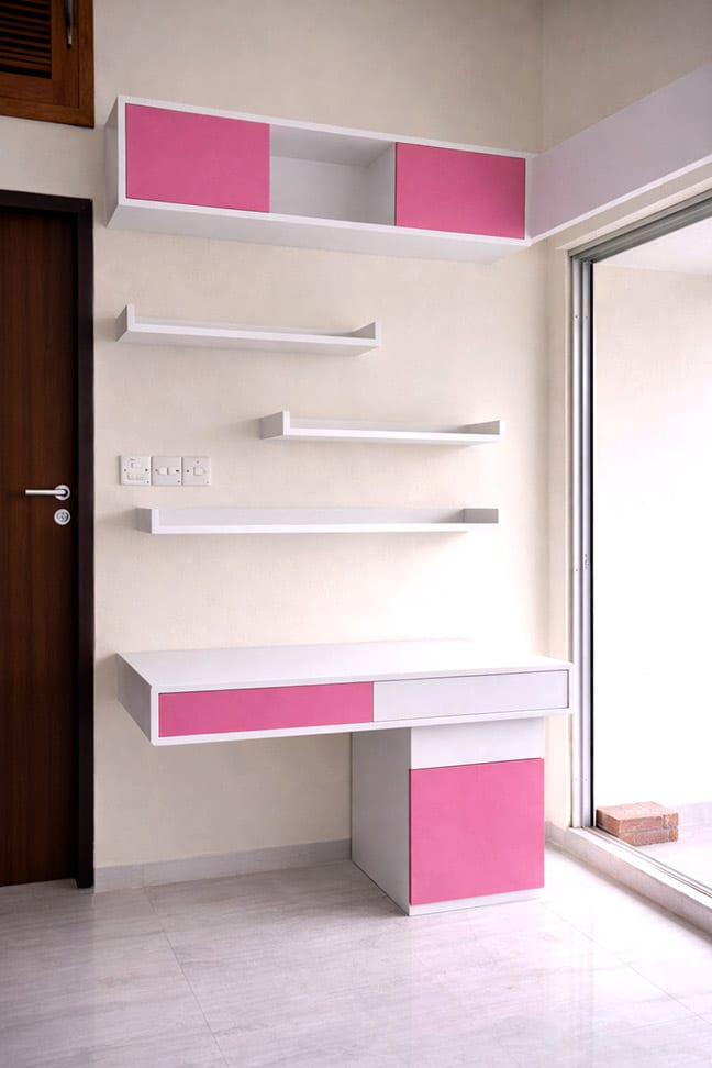 Child's bedroom with custom Duco-painted bed and matching study table - residence interior design in Mirpur, Dhaka