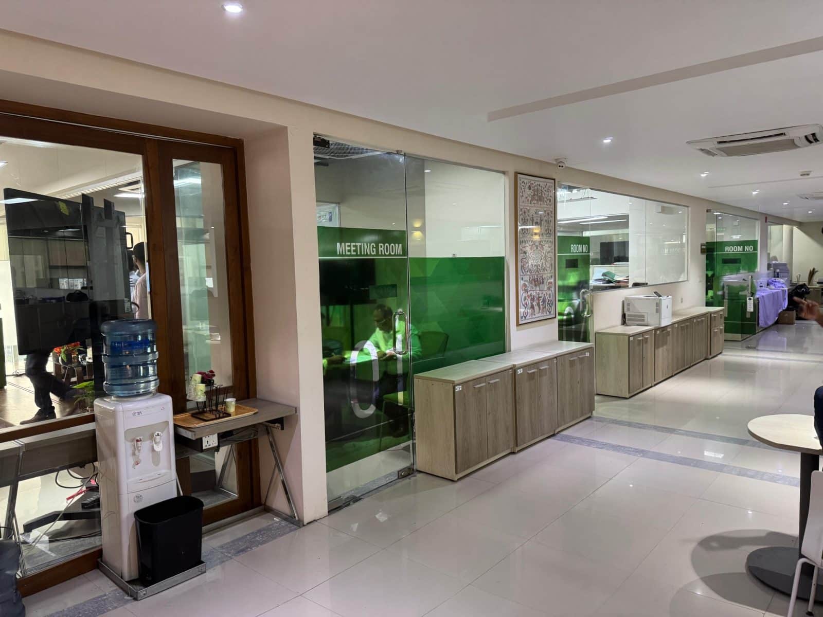 Office corridor with glass partitions and panels - a2i office interior design, ICT Tower, Dhaka