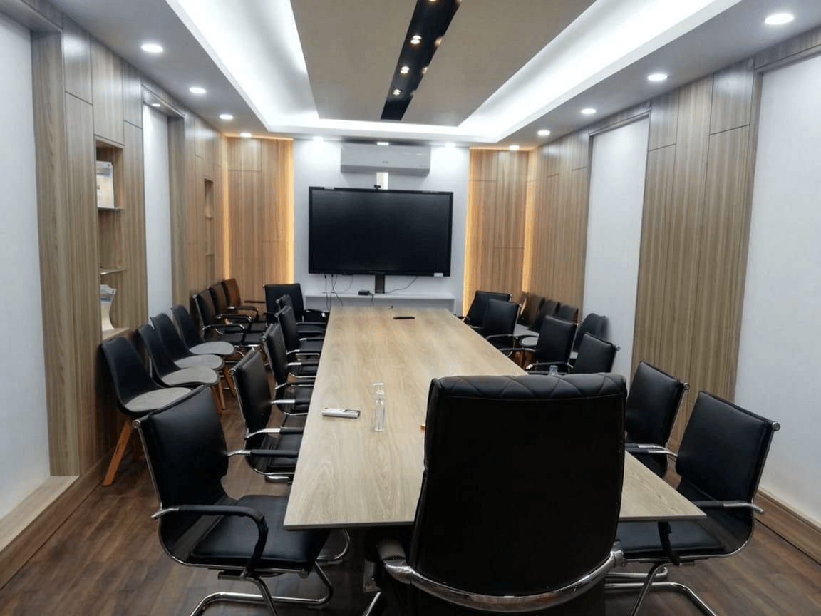 Large conference room with custom table and seating in Planning Ministry
