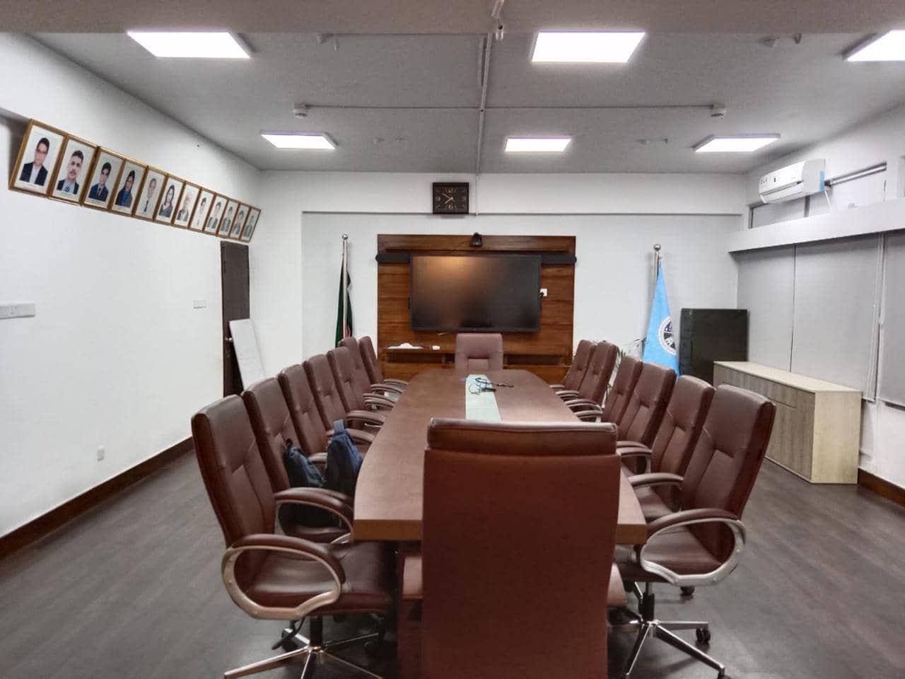 Office renovation conference room front view with modern seating meeting table