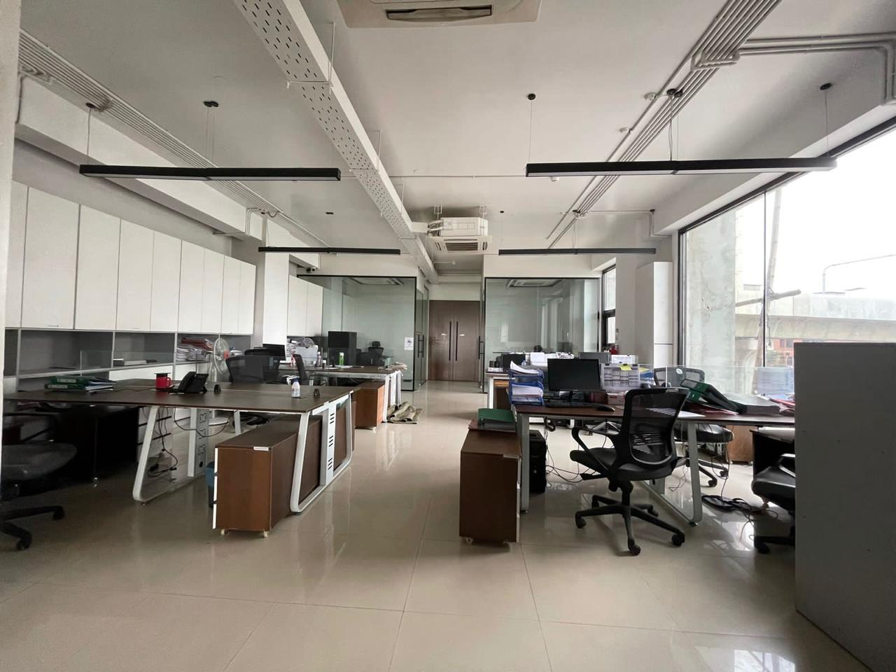 Workstation area with modular desks and daylight at the Creative Engineers head office in Mirpur, Dhaka, 10,500 sft across three floors