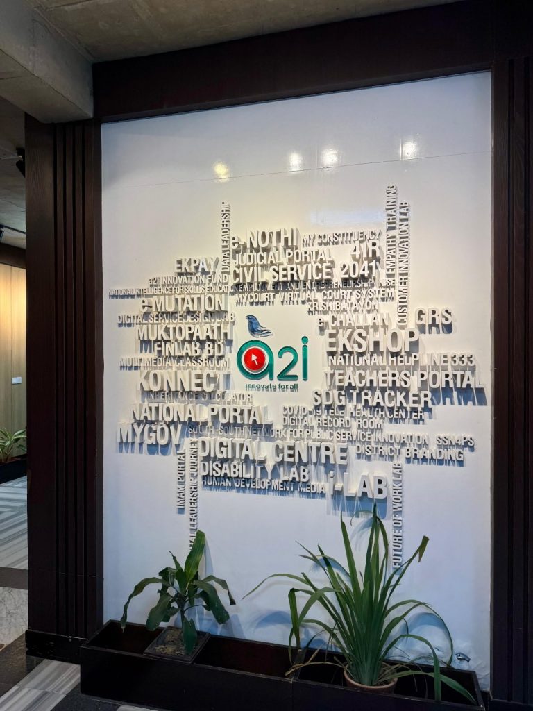 A2i lobby typography feature wall with planters