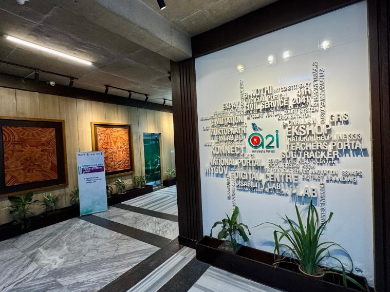 A2i lobby typography feature wall with planters