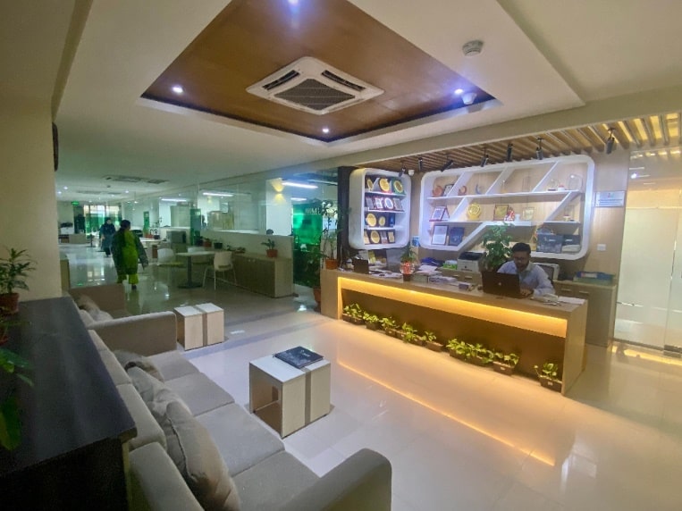 Backlit reception desk with ceiling feature