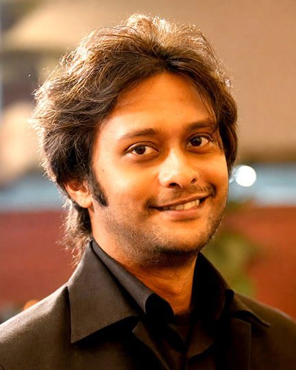 Smiling portrait of Kazi Mohammad Alam Kaiser, founder of Studio Archifiction interior design and building design firm in Dhaka, Bangladesh